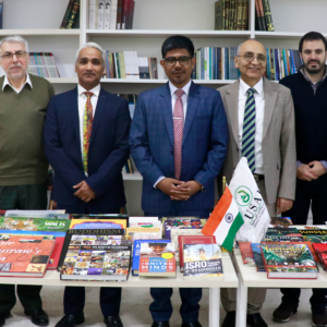 The Indian Embassy presents a collection of various books to the USAL Library